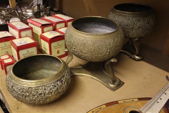 Three Indian brass bowls, 2 with cobra stands